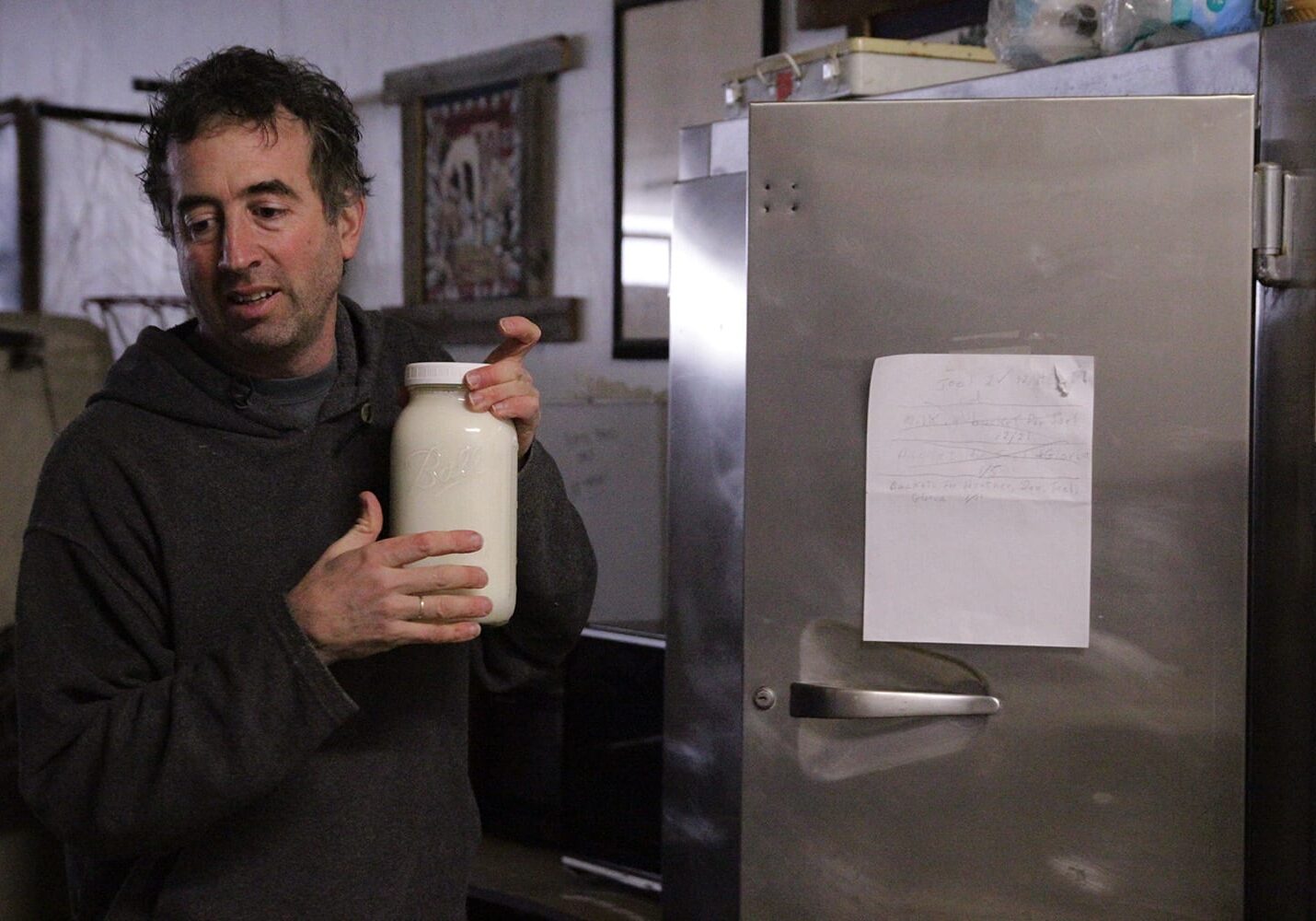 Joel Gruver is the milkman for a group of raw milk drinkers in Macomb, Ill. Every Sunday, he makes a two hour trip to pick up 12 gallons. The group has been active since 2011. (Abby Wendle/Harvest Public Media)