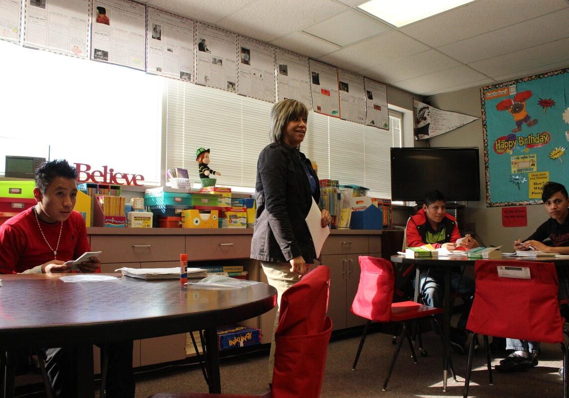 A teacher and students in a classroom