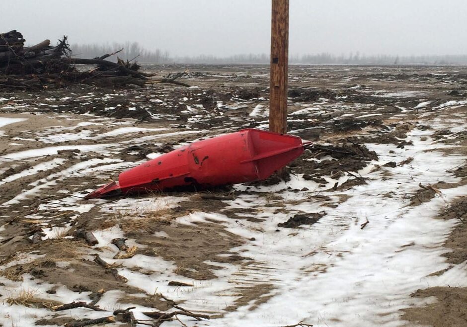 Winter flooding in Alexander county, Illinois, left farmland covered in water, sand and debris.
