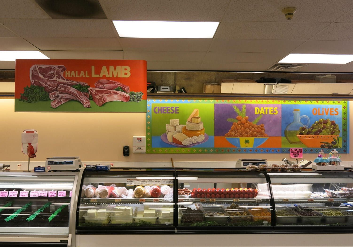 Customers at Arash International Market in Aurora, Colorado, often clamor for cuts of lamb. (Photo: Luke Runyon/Harvest Public Media)