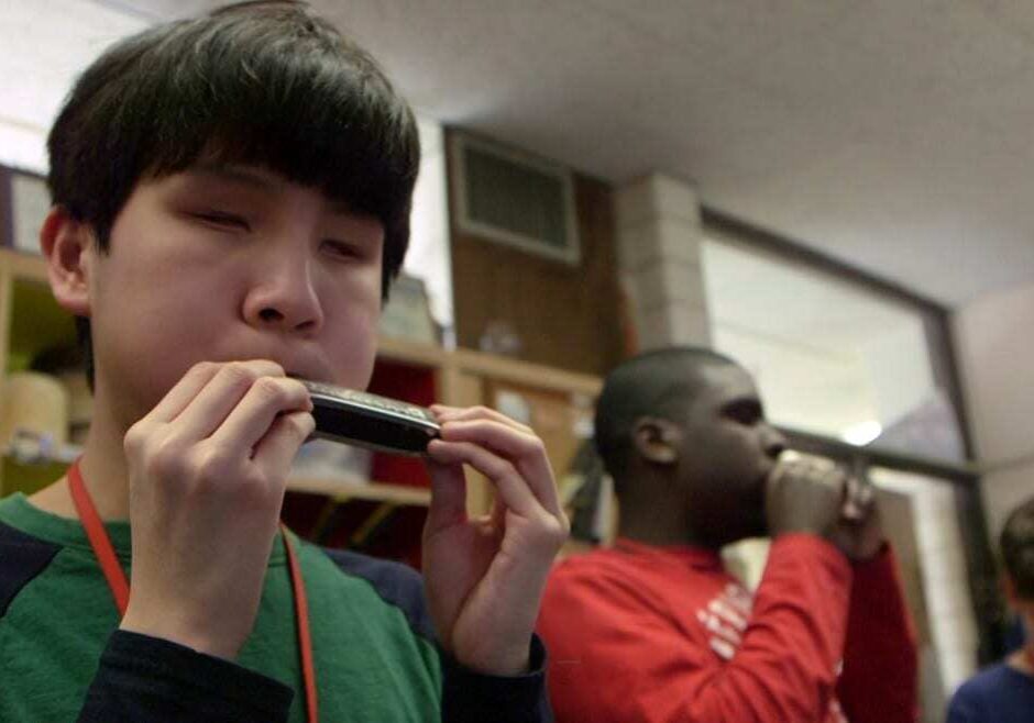 KSSB Student Gabriel Lewis plays his first notes on his brand new harmonica.