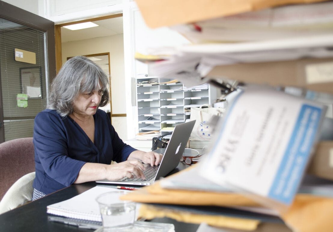 A woman at her desk