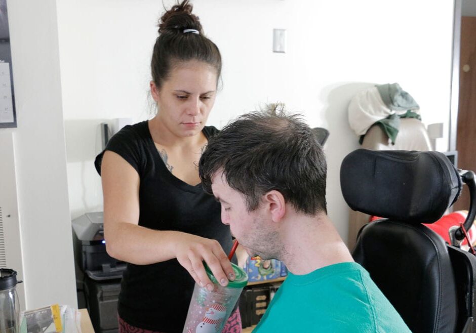 Jason Gallagher and his assistant