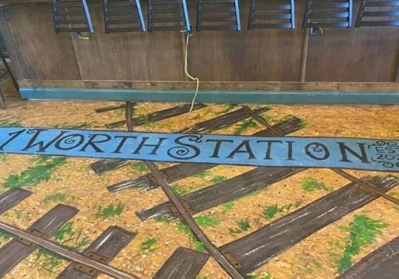 The interior of 11 Worth Station brewery in Leavenworth features railroad tracks painted on the floor.