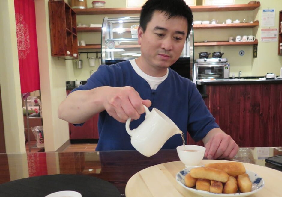 Pouring tea with sweet bread.