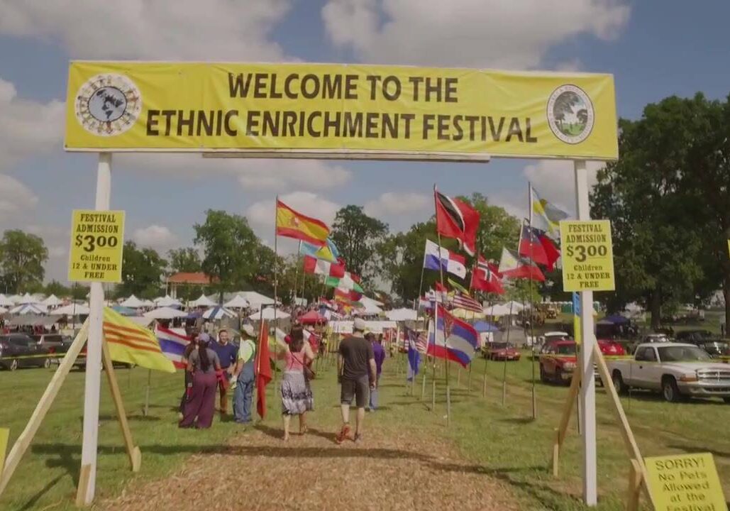 A group of people enter the Ethnic Enrichment Festival.