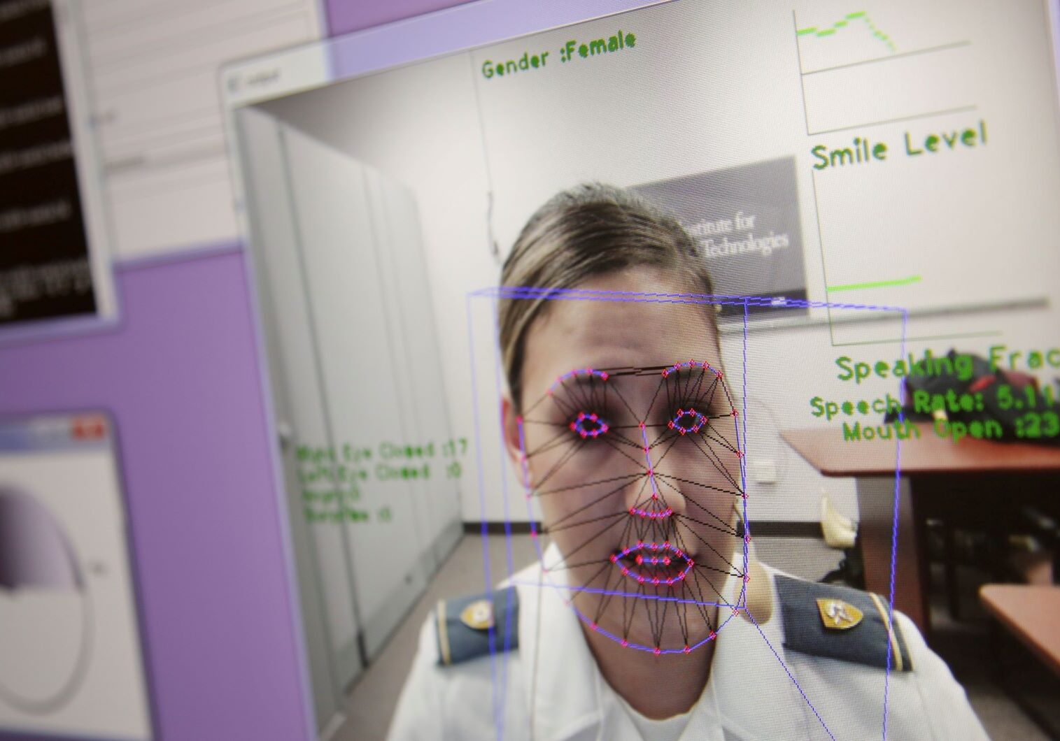 A computer monitors some of Cadet Cheyenne Quilter's reactions as she works with a virtual reality character named "Ellie" at the U.S. Military Academy at West Point, N.Y.