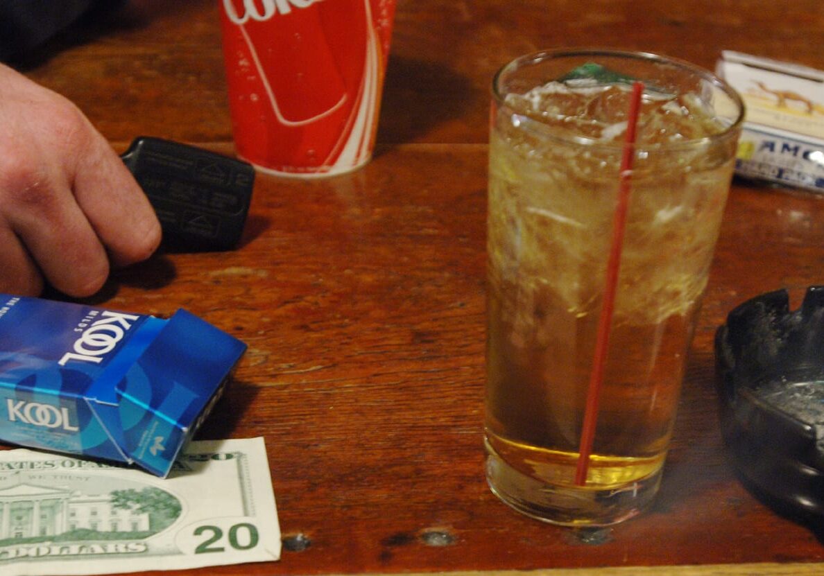A cigarette smolders in an ashtray on the bar of Booche's on Thursday, Nov. 17, 2005, in Columbia, Mo. Columbia's health department is on the verge of bringing forward a no-smoking ordinance that would prohibit indoor tobacco use in public places like bars and restaurants. (AP Photo/L.G. Patterson)