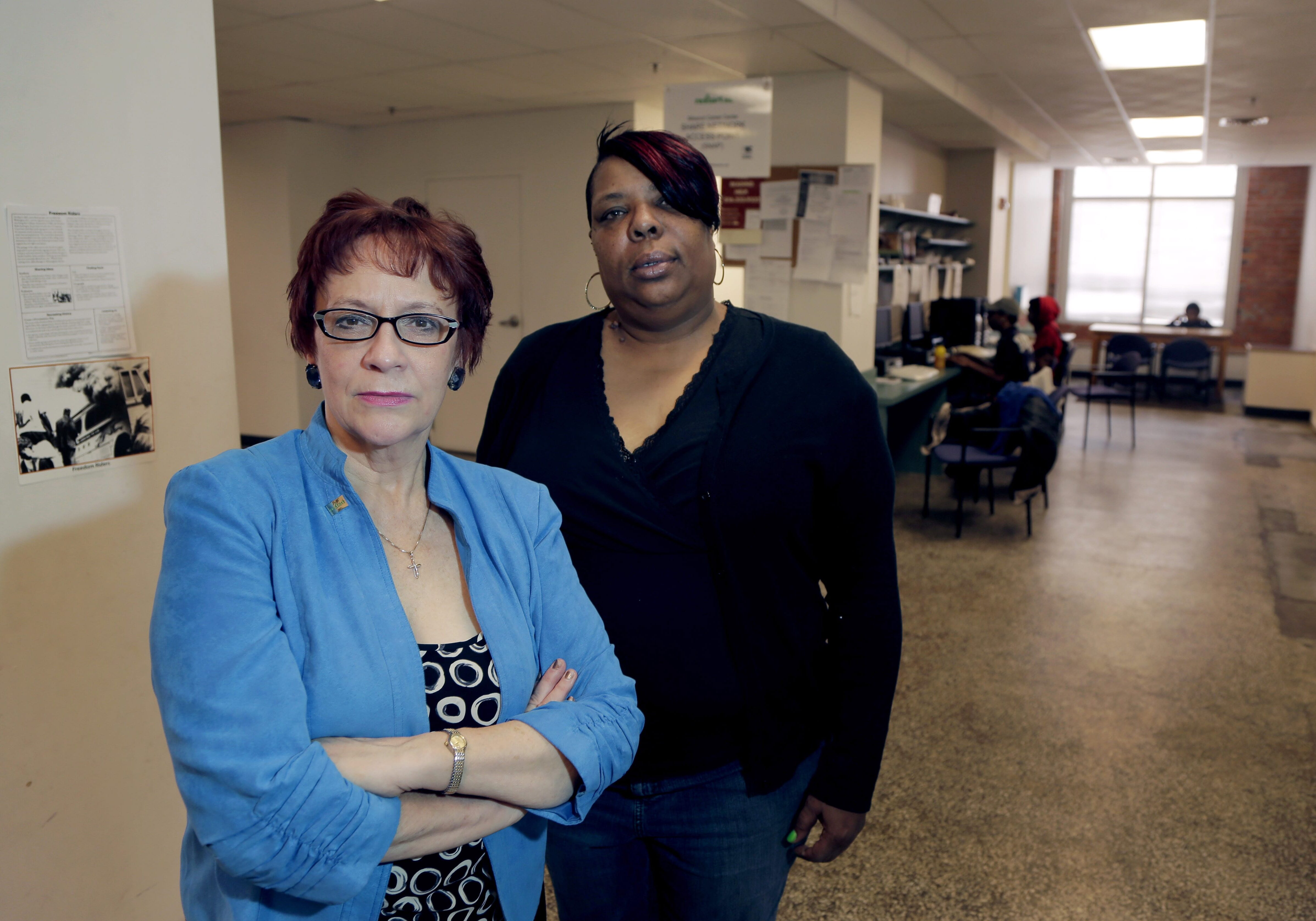 In this March 19, 2013 photo, Evelyn Craig, left, executive director of reStart Inc., and LaTonya Jenkins, a reStart client who lives at the facility, pose at the homeless shelter in Kansas City, Mo. The women are concerned that Missouri's refusal to expand Medicaid under the Affordable Care Act will harm residents of the shelter like Jenkins. (AP Photo/Charlie Riedel)