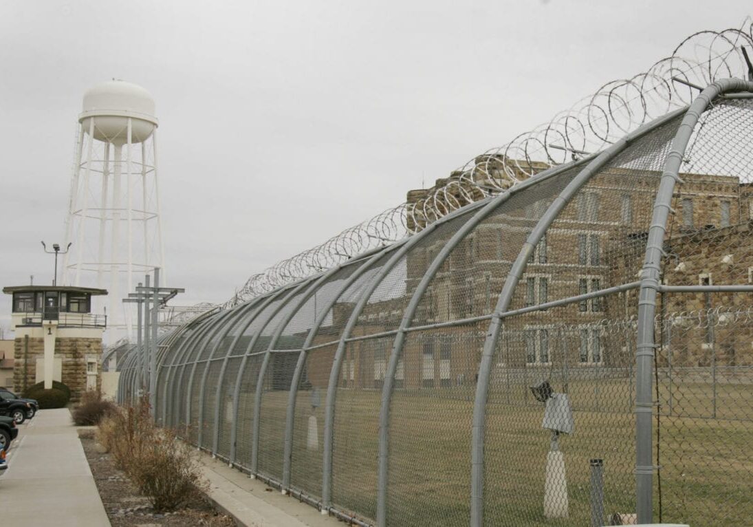 barbed wire around state correctional facility