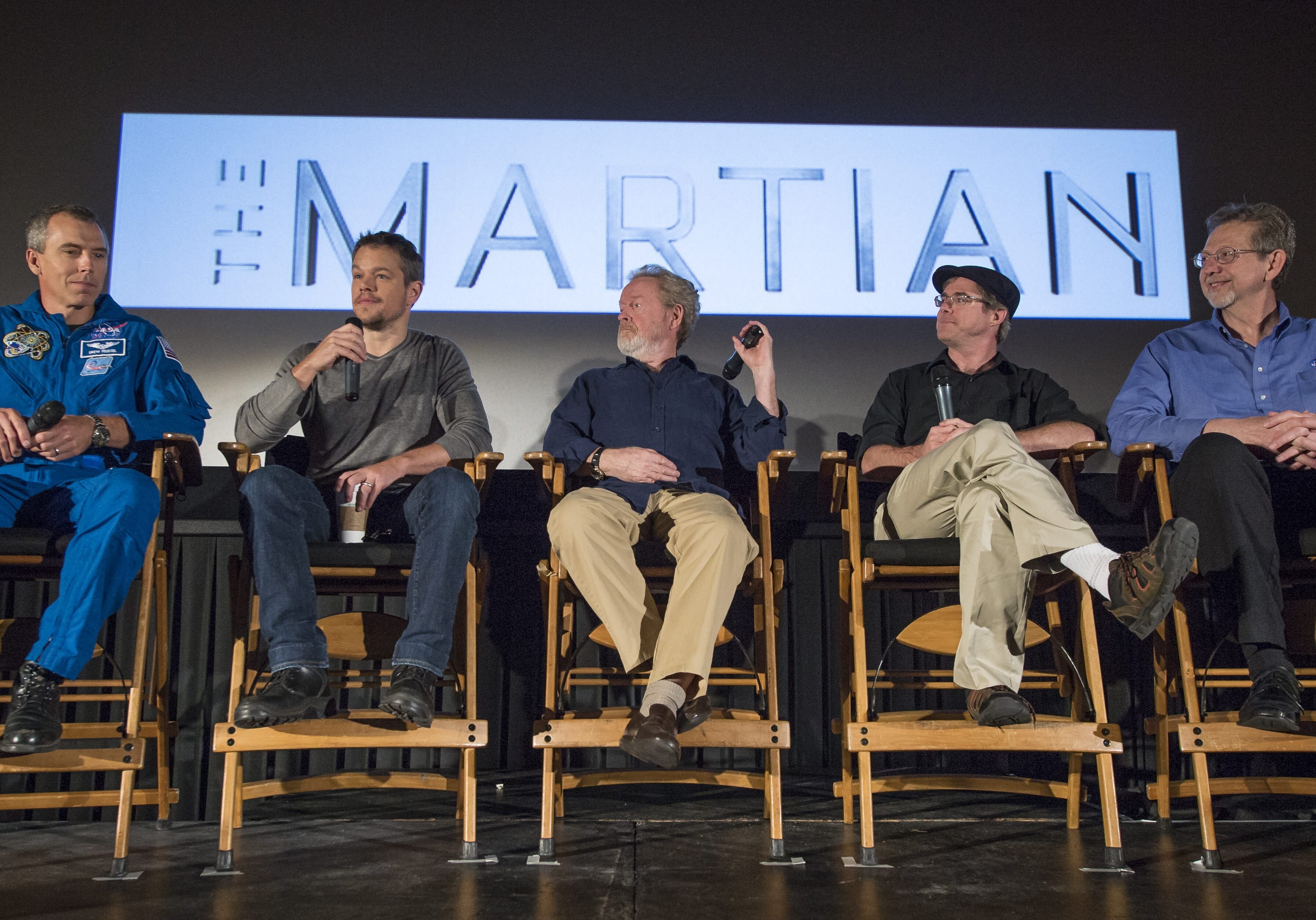 Astronaut Drew Feustel, from left, actor Matt Damon, director Ridley Scott, author Andy Weir, and Director of the Planetary Science Division at NASA Headquarters Jim Green, participate in a question and answer session about NASA’s journey to Mars and the film "The Martian." The movie, based on the book by Andy Weir, gives a realistic view of the climate and topography of Mars and has been read in space. (Photo: Bill Ingalls | NASA via AP)