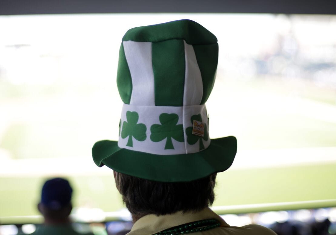 a man in a shamrock hat