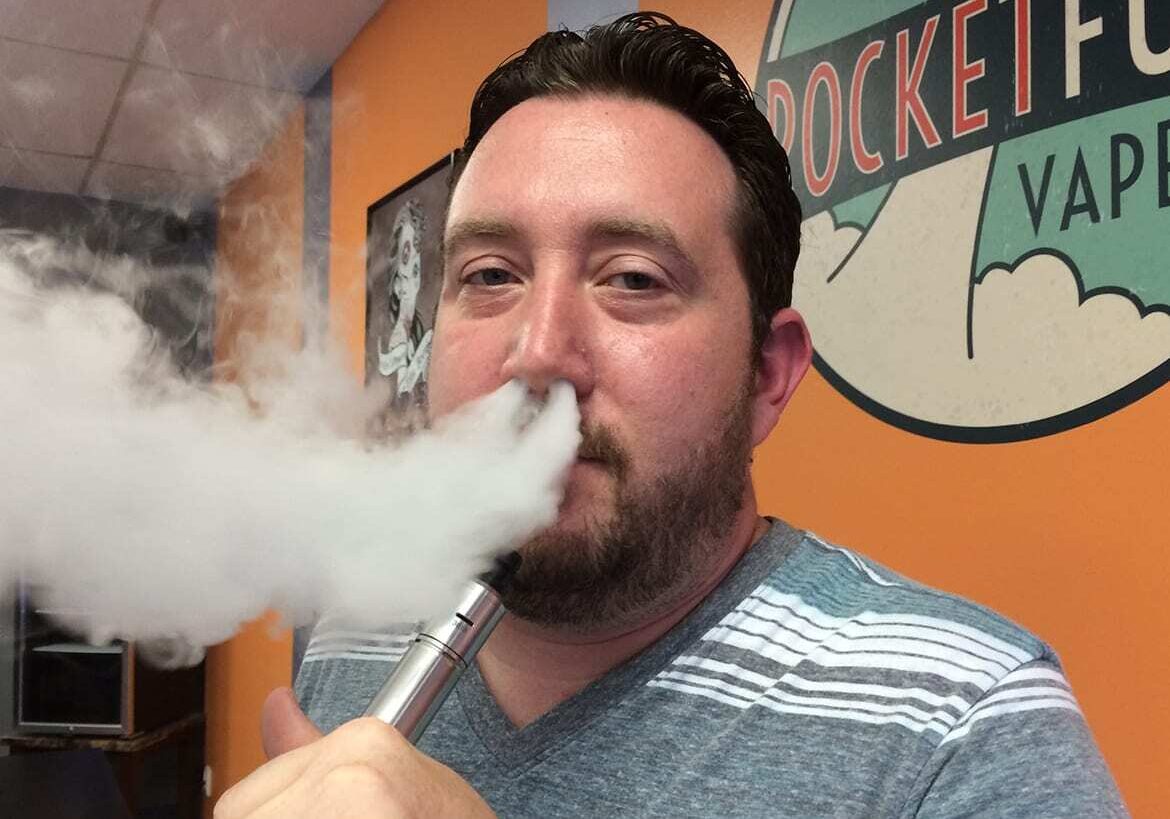 E-cigarette retailer Aaron Todd says "vaping" helped him quit smoking. (Photo by Alex Smith/KCUR)