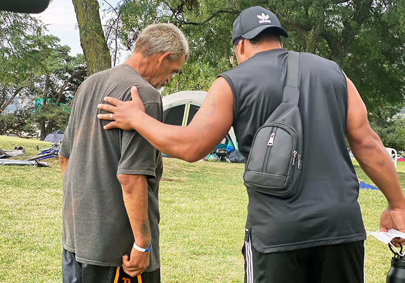 Anton Washington, who leads the Houseless Task Force, helped folks get situated at an encampment on 11th Street and Harrison Ave.