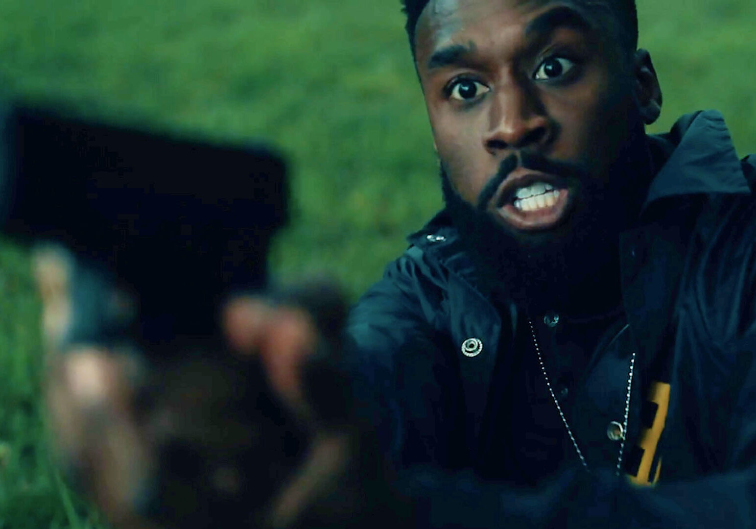 A man with a gun in a scene from "The Pulpit: Prelude.".