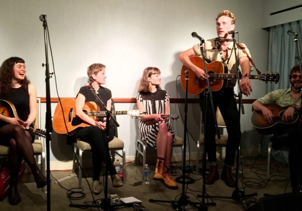 (From left), Elsie Rigby of the Mae Trio, Mia Dyson, Rowena Wise, Kaurna Cronin (standing) and Henry Wagons performed in the Aussie Room, a private showcase, in 2016.
(Contributed | Donna Trussell)