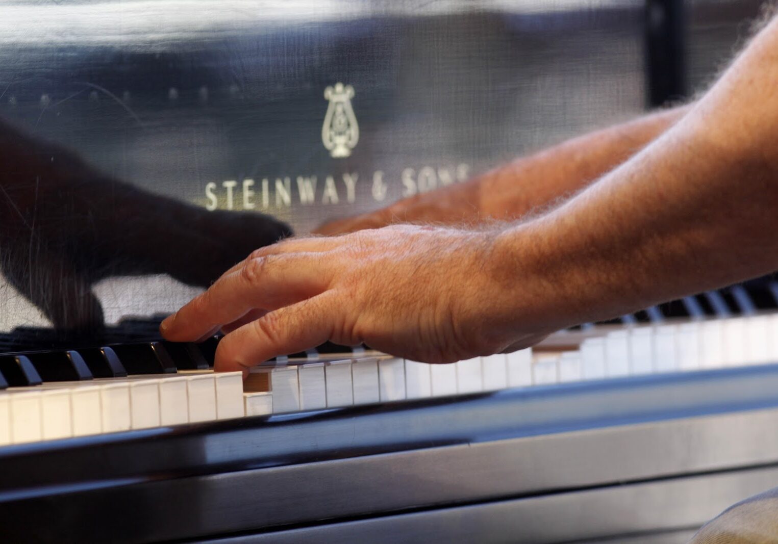 John Cleary playing piano