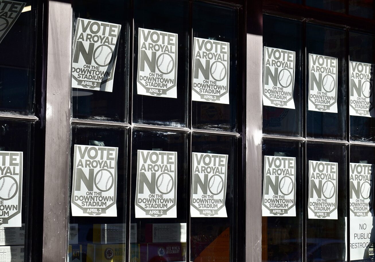 “Vote No” signs stuck in the windows on The Pairing in the East Crossroads.