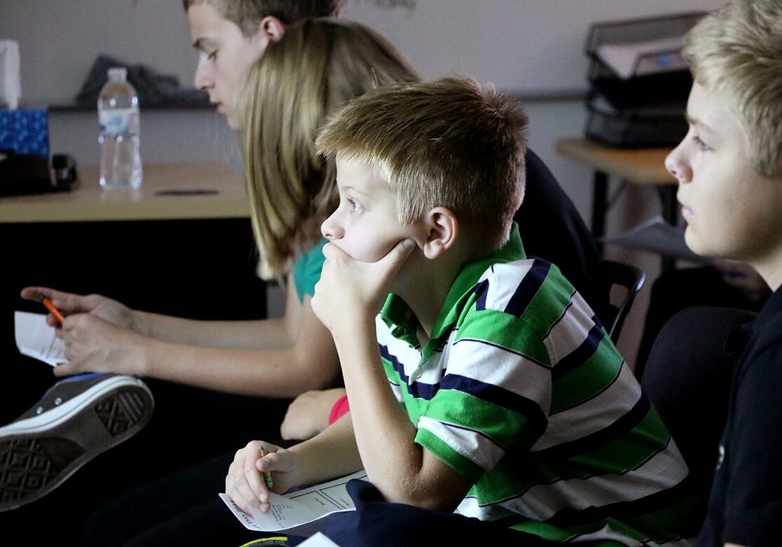 Photo of students in a classroom.