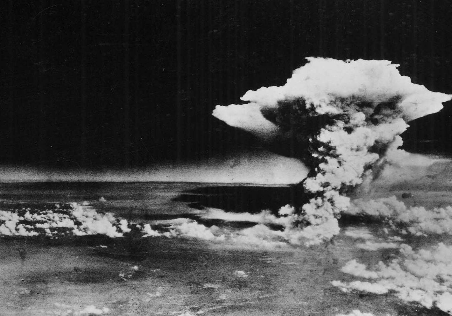 An Air Force reconnaissance photo taken several hours after an atomic bomb was dropped on Hiroshima, Japan, on Aug. 6, 1945.