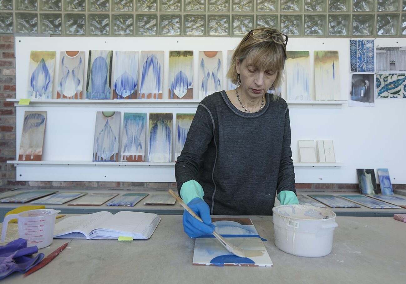 Cary Esser glazes ceramic tiles for a new series of work titled "Veil Tyles"