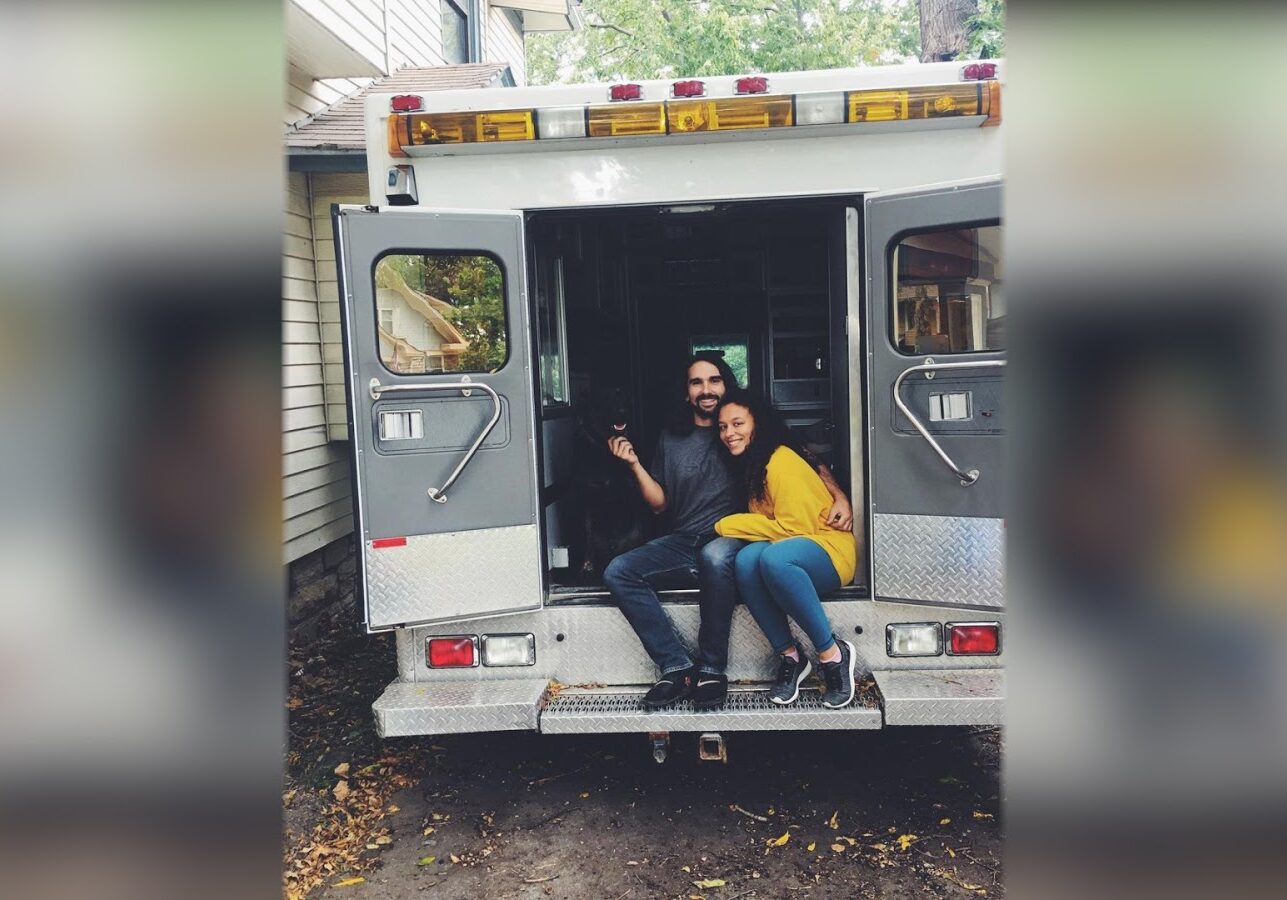Here's Hartman and Canady seated in their ambulance-turned-camper. (Contributed)