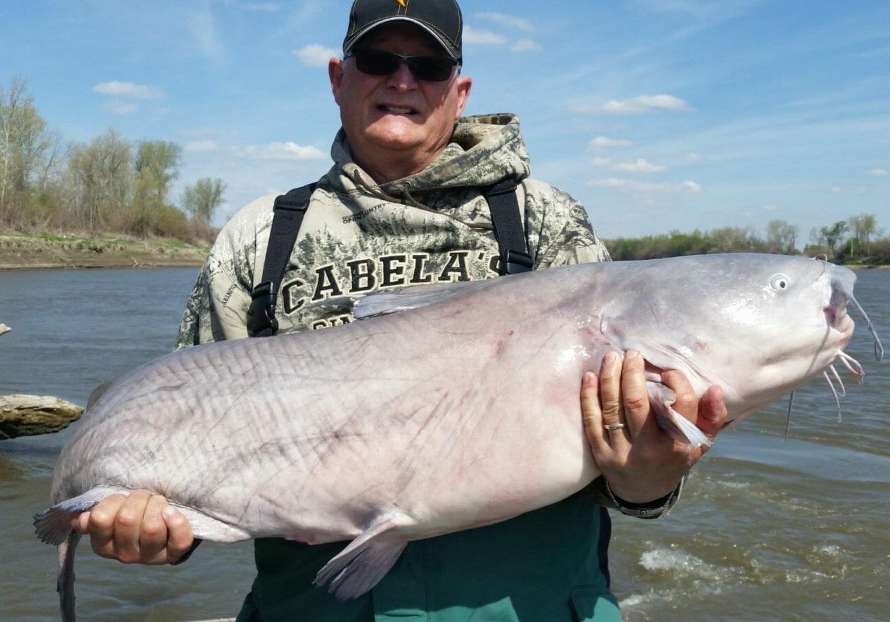 Angler John Jamison holds a 68-pound fish he caught in the Kansas River near downtown.