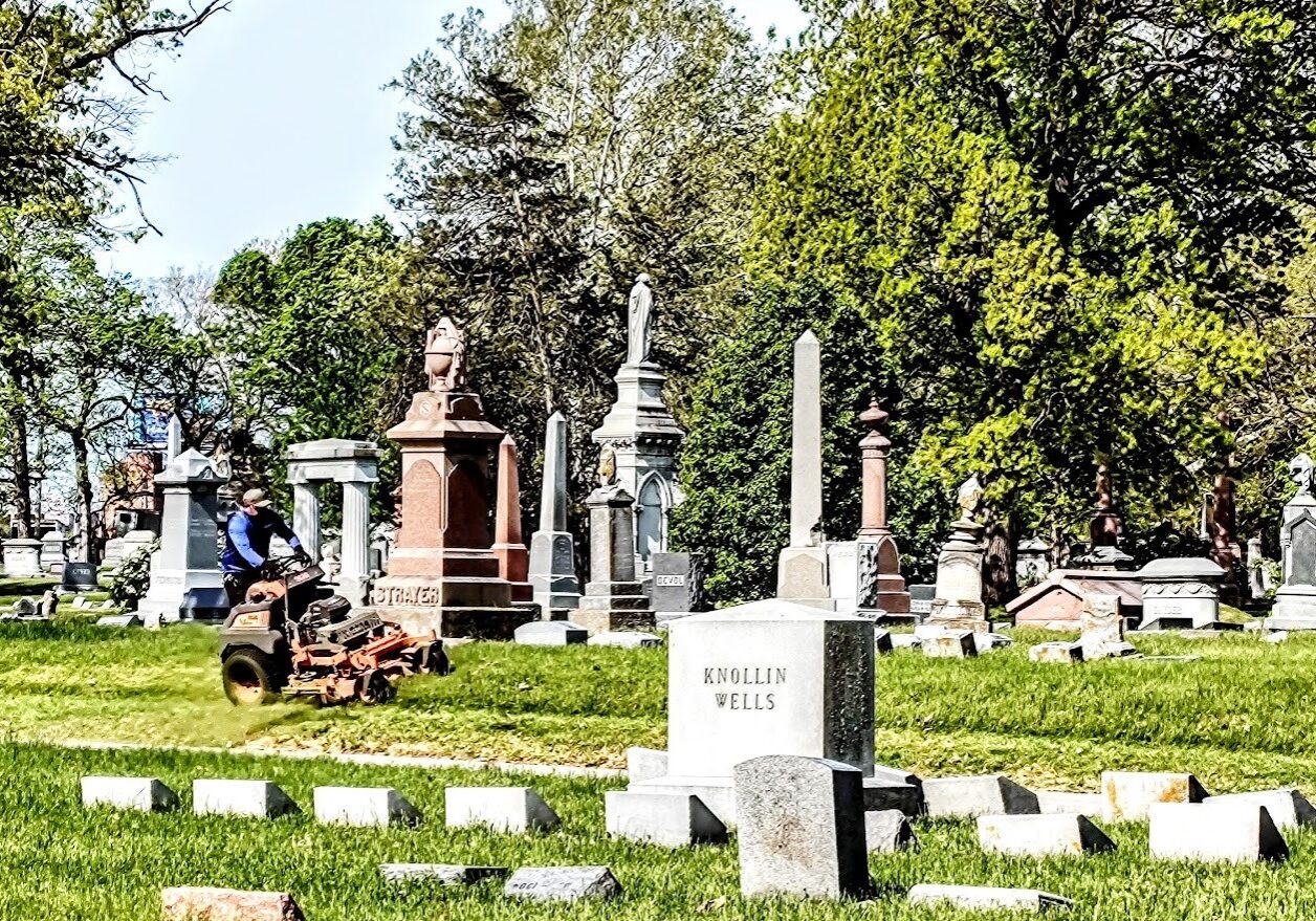 Elmwood Cemetery being mowed.