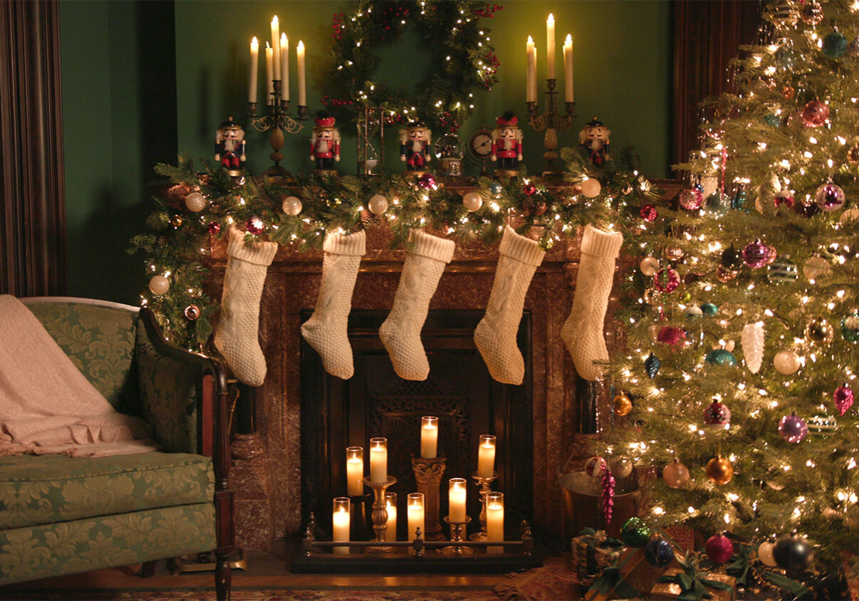 Stockings hang above a fire place.