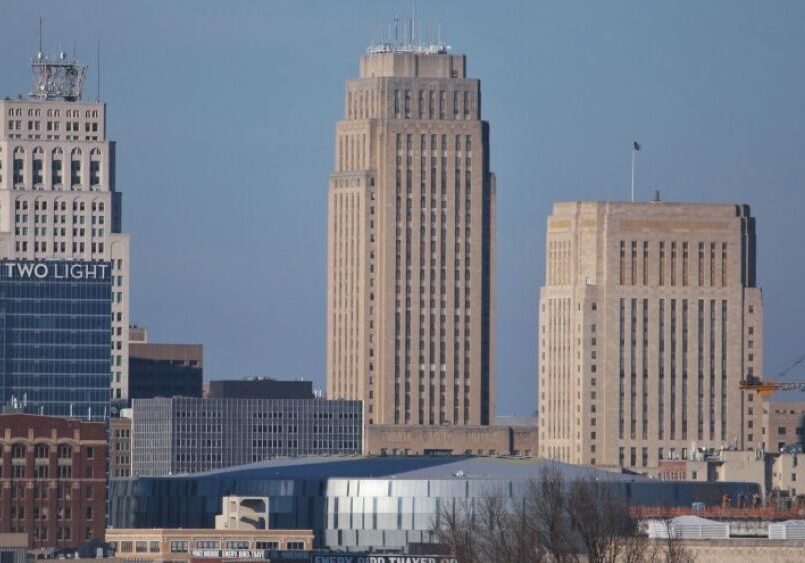 City Hall and the Jackson County Courthouse at the center of the downtown Kansas City skyline.