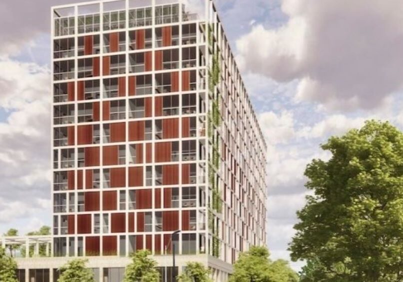 The proposed 13-story City Harvest apartment project would be located on a parking lot immediately west of the City Market.