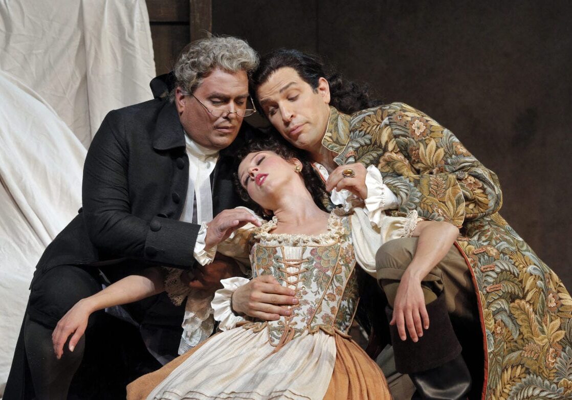 Three actors in a scene from “The Marriage of Figaro."