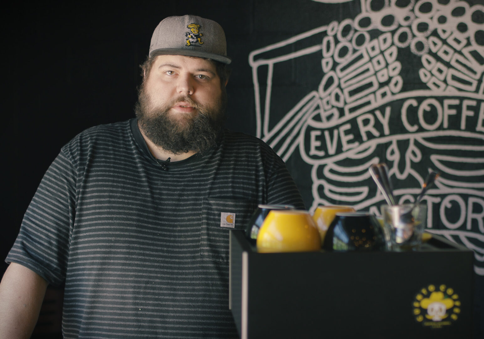 Owner Andy Gallant behind the coffee cart for Cuento Coffee at Crane Brewing Company (Emily Woodring | Flatland).