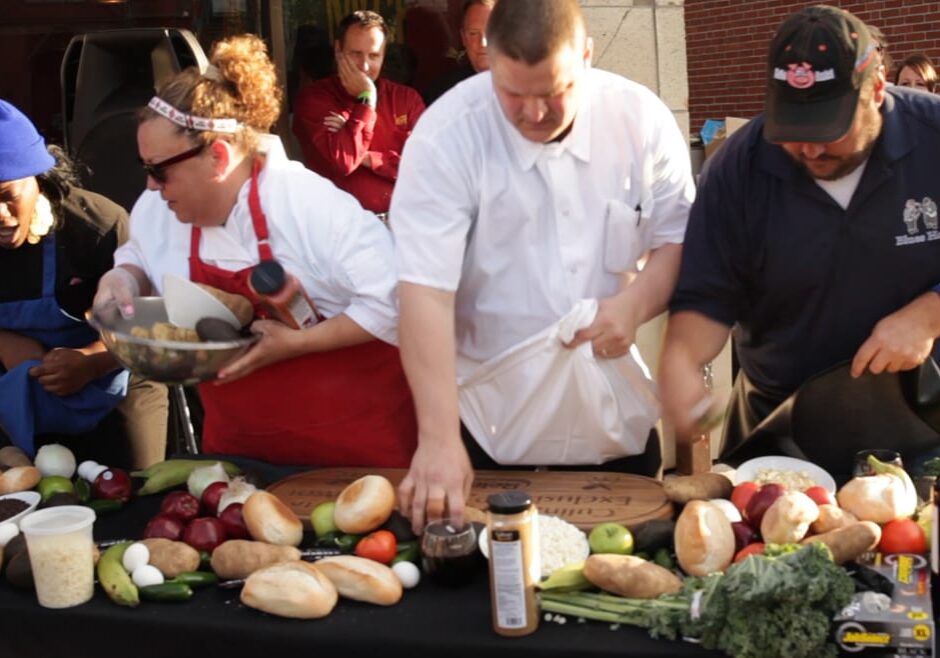 Competitors in a cooking contest gather food
