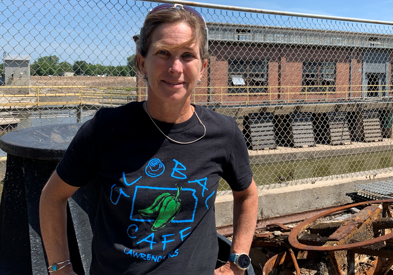 Sarah Hill-Nelson standing in front of Bowersock Mills & Power Co.’s hydroelectric plant.