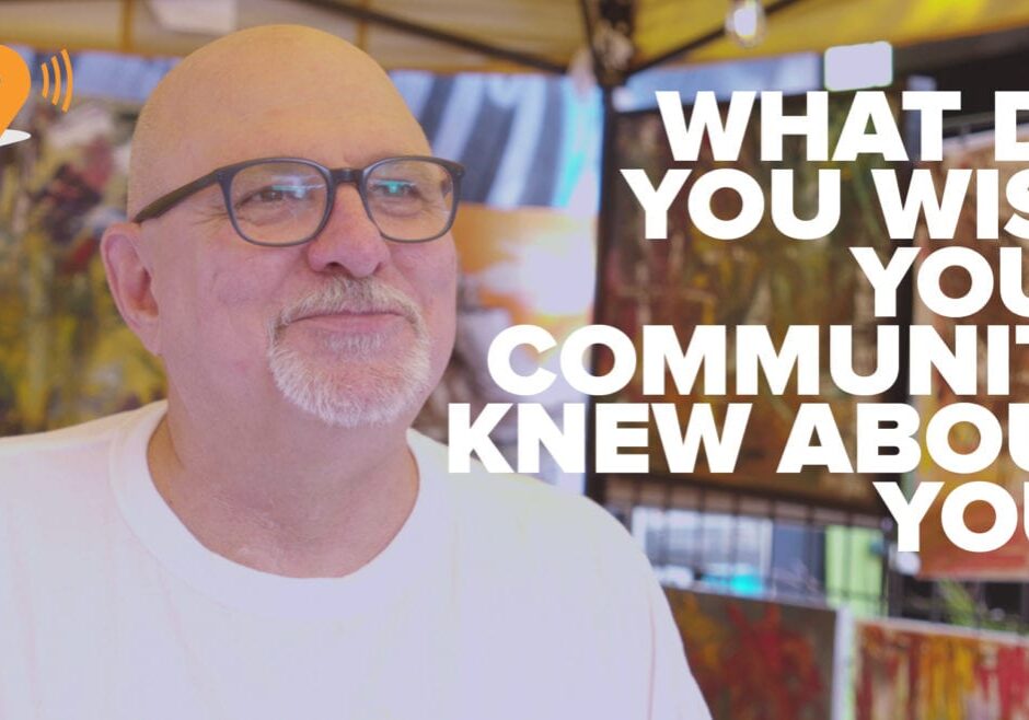 a man with text one a graphic behind him