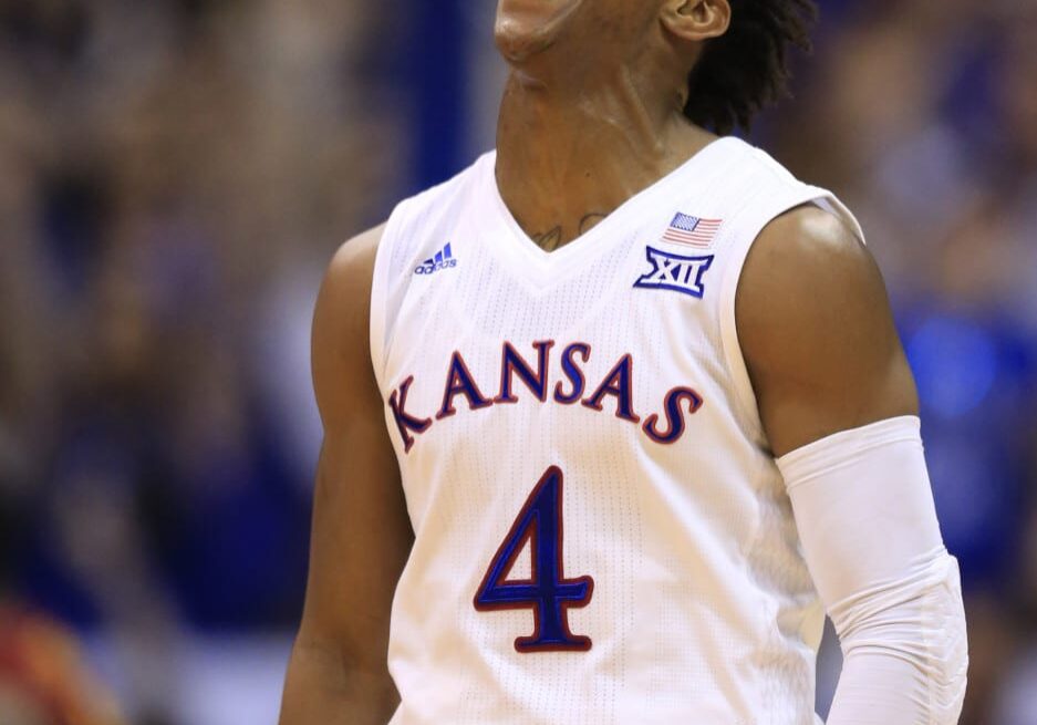 Kansas guard Devonte' Graham (4) celebrates during the second half of an NCAA college basketball game against Iowa State in Lawrence, Kan., Saturday, March 5, 2016. (Photo: (Orlin Wagner | AP)