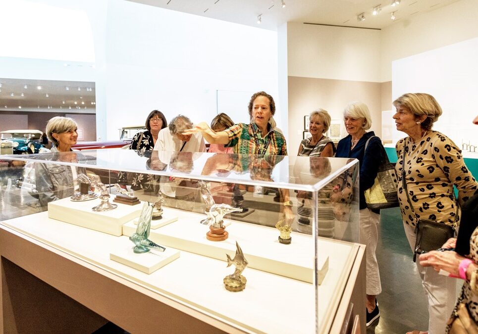 In early September, Nelson-Atkins Museum of Art docent Misty McNally (center) led a group tour of the museum’s “American Art Deco” exhibition, which continues through Jan. 8.