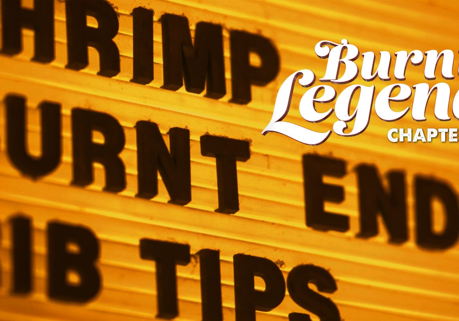 photo of a barbecue sign with the words Burnt Legend on it