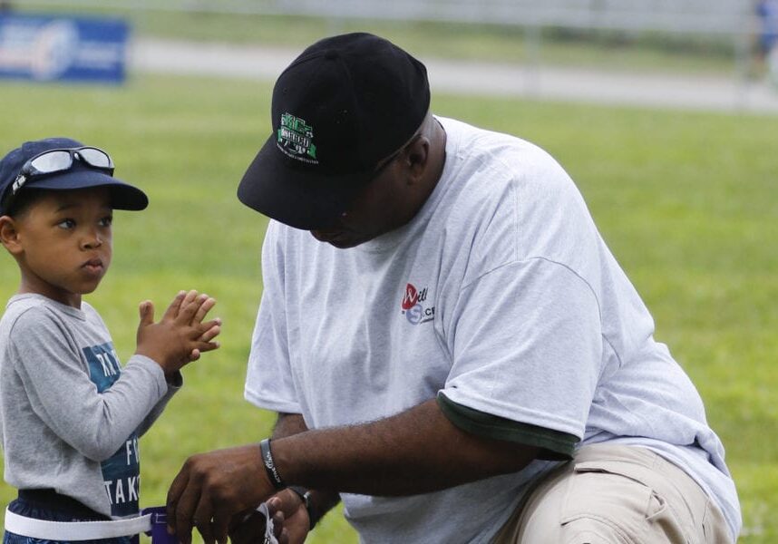 Pastor Roberson with child