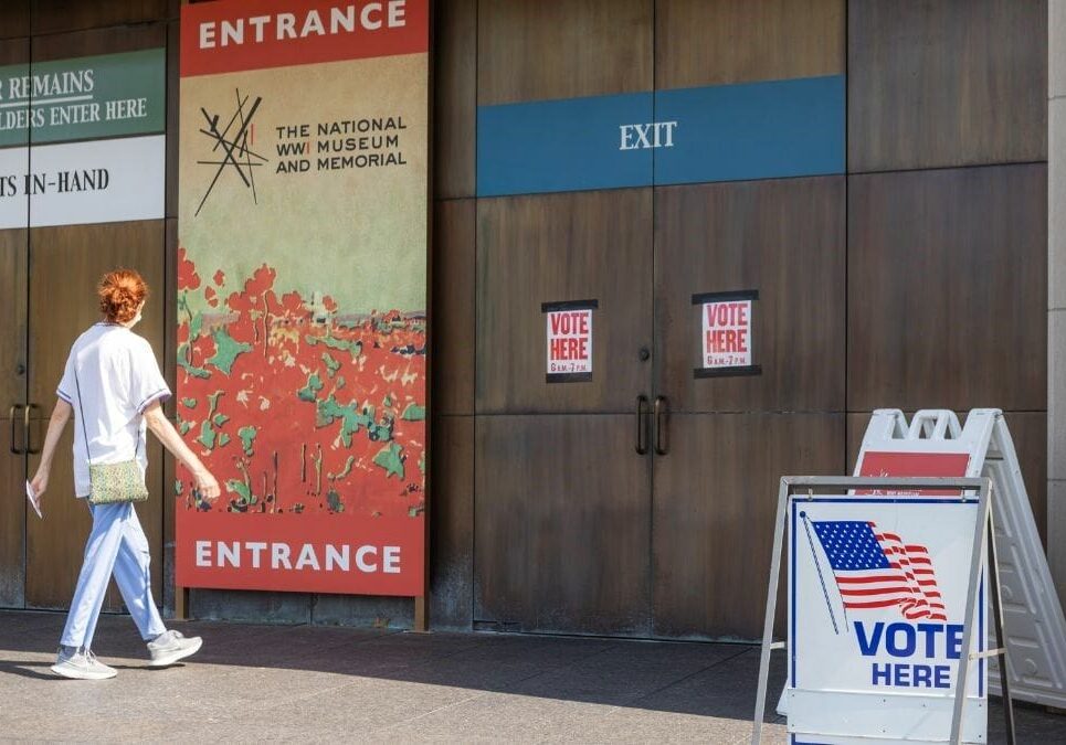 A voter enters a polling location at the National World War I Museum and Memorial to submit a ballot.