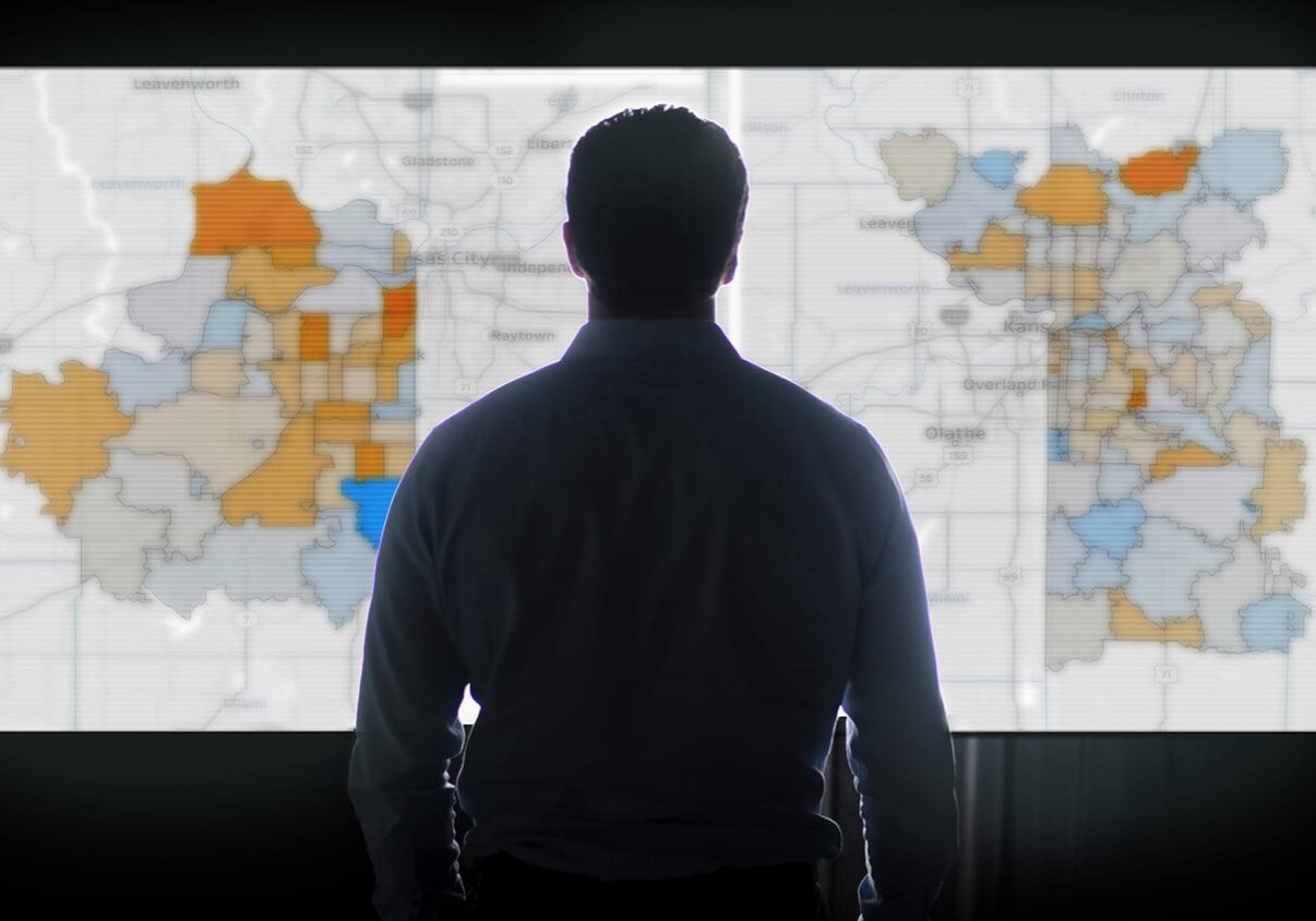 Research intern Ryan Hennessy works on a data visualization that came from information he collected over 44 days in the Wyandotte County Courthouse.