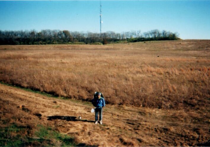 A man walking in a field