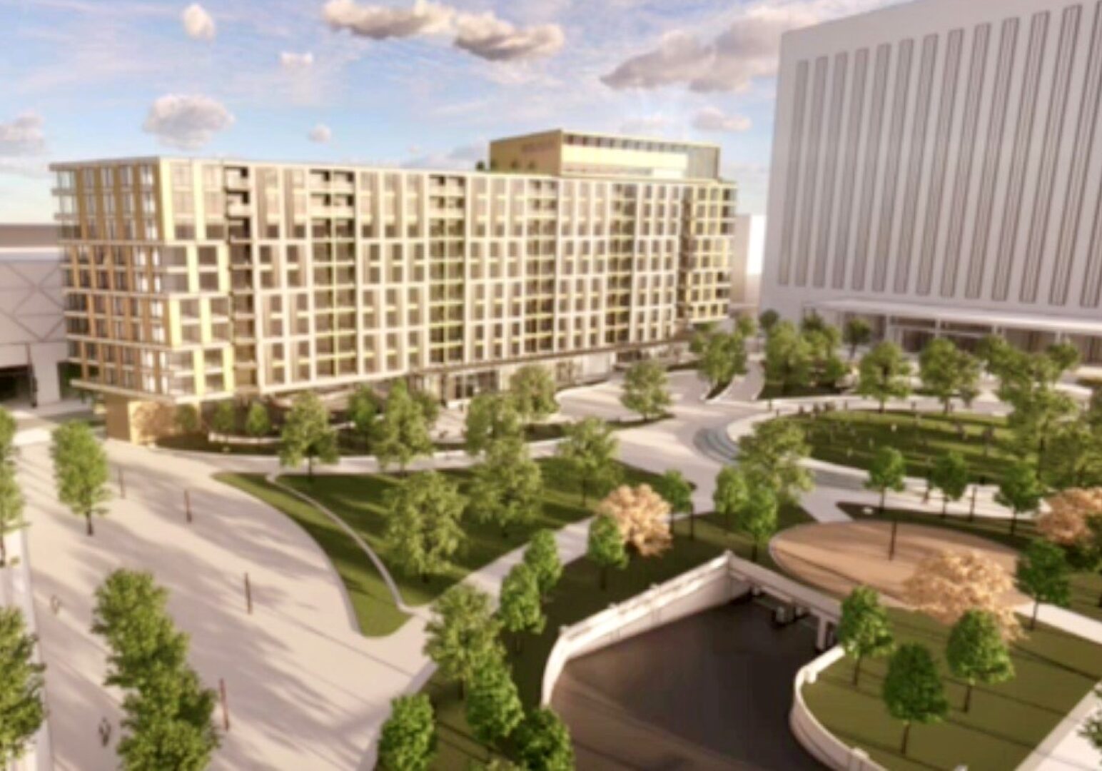 A rendering of the proposed 10-story, 226-unit apartment project proposed by Development Collaborative. with a redeveloped Barney Allis Plaza in the foreground.