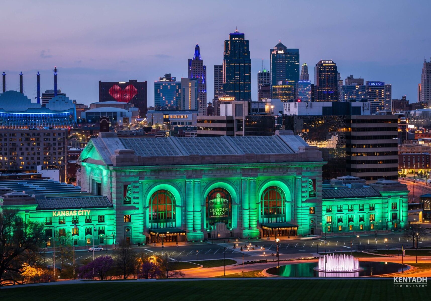 Union Station and the Kansas City skyline lit up at night.