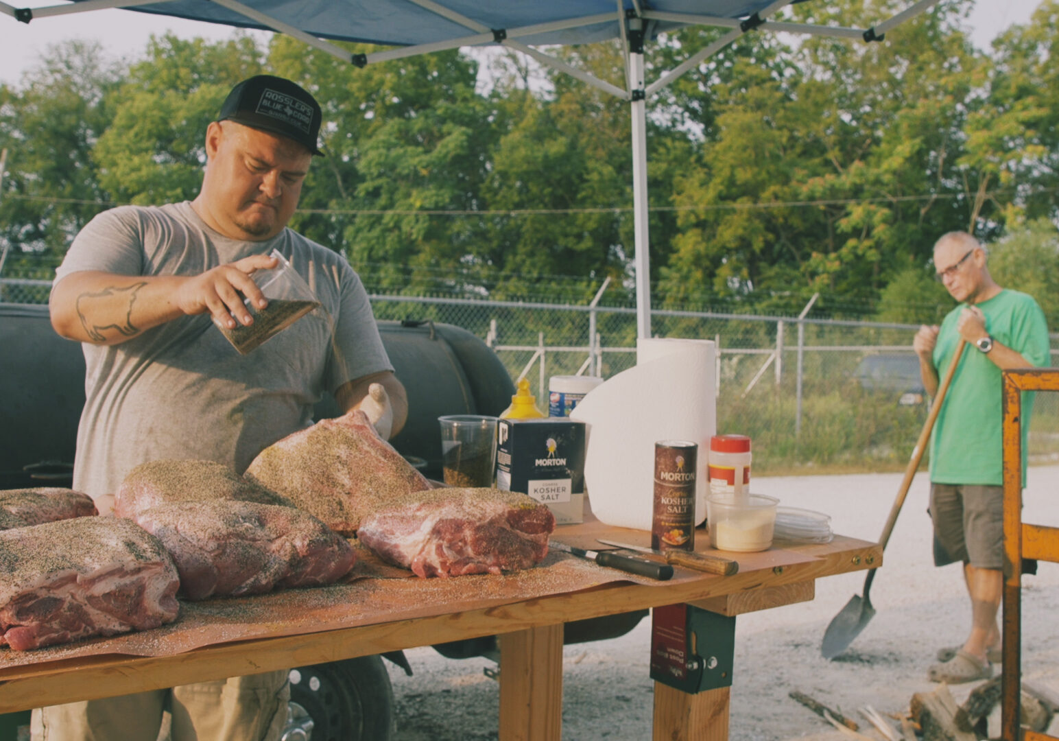 Tyler and Bob Harp prepping "craft barbecue" brisket.