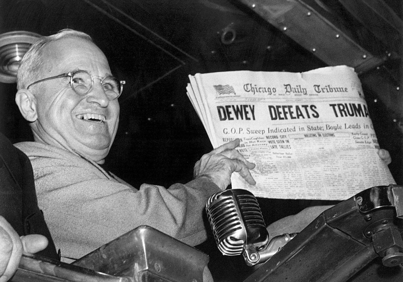 Harry Truman celebrating his upset election victory over Thomas Dewey.