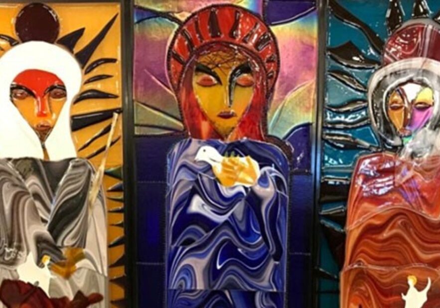 The Holy Family — Jesus, Mary and Joseph — are depicted in Hasna Sal’s glass artwork on display at a Catholic center in Kansas City, Kansas.