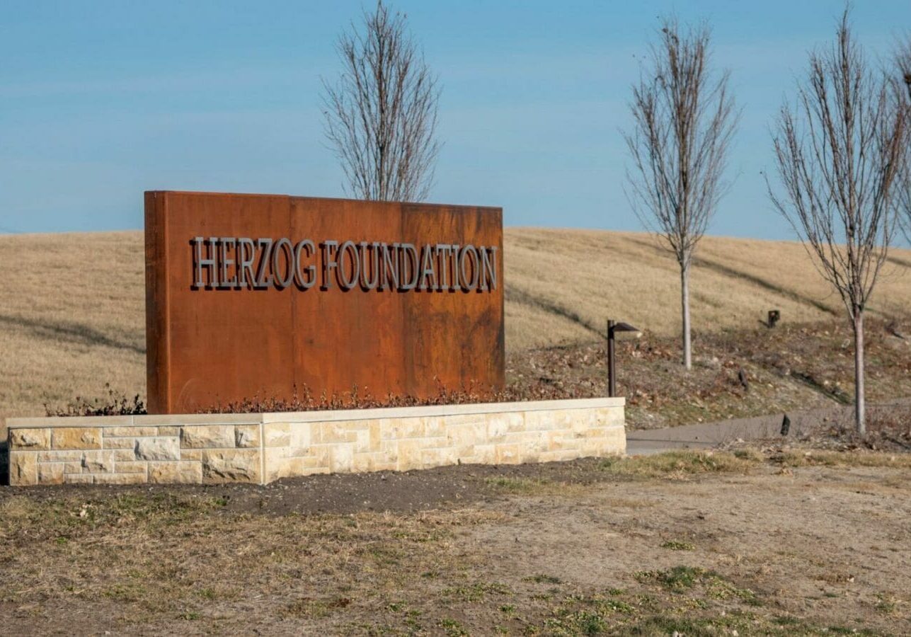 Monument sign for the Herzog Foundation in Smithville.