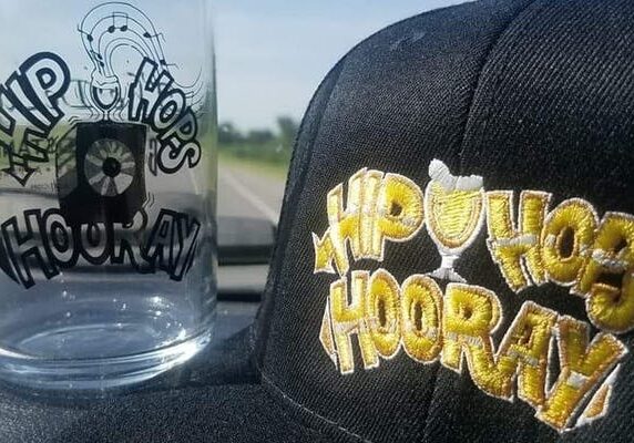 Hip Hops Horray presented on black and glass cup